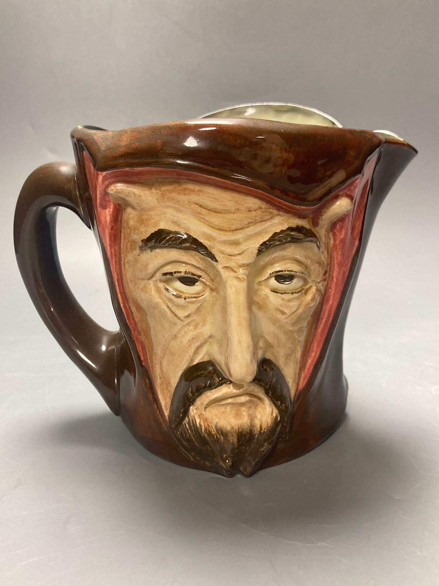 A Royal Doulton Mephistopheles large character jug, 15cm high